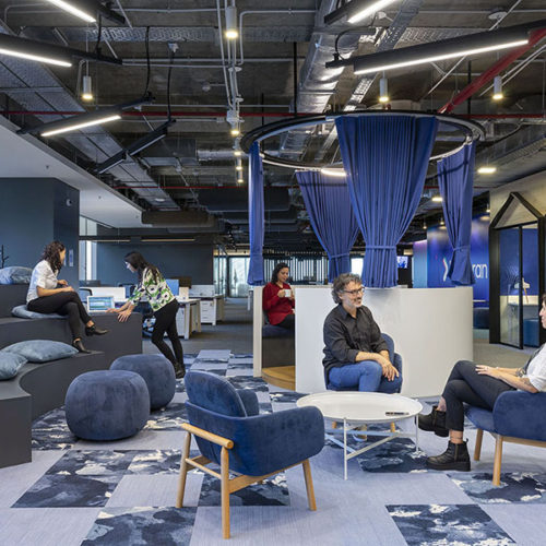 Diseño de oficina de Navent Argentina por Contract Workplaces